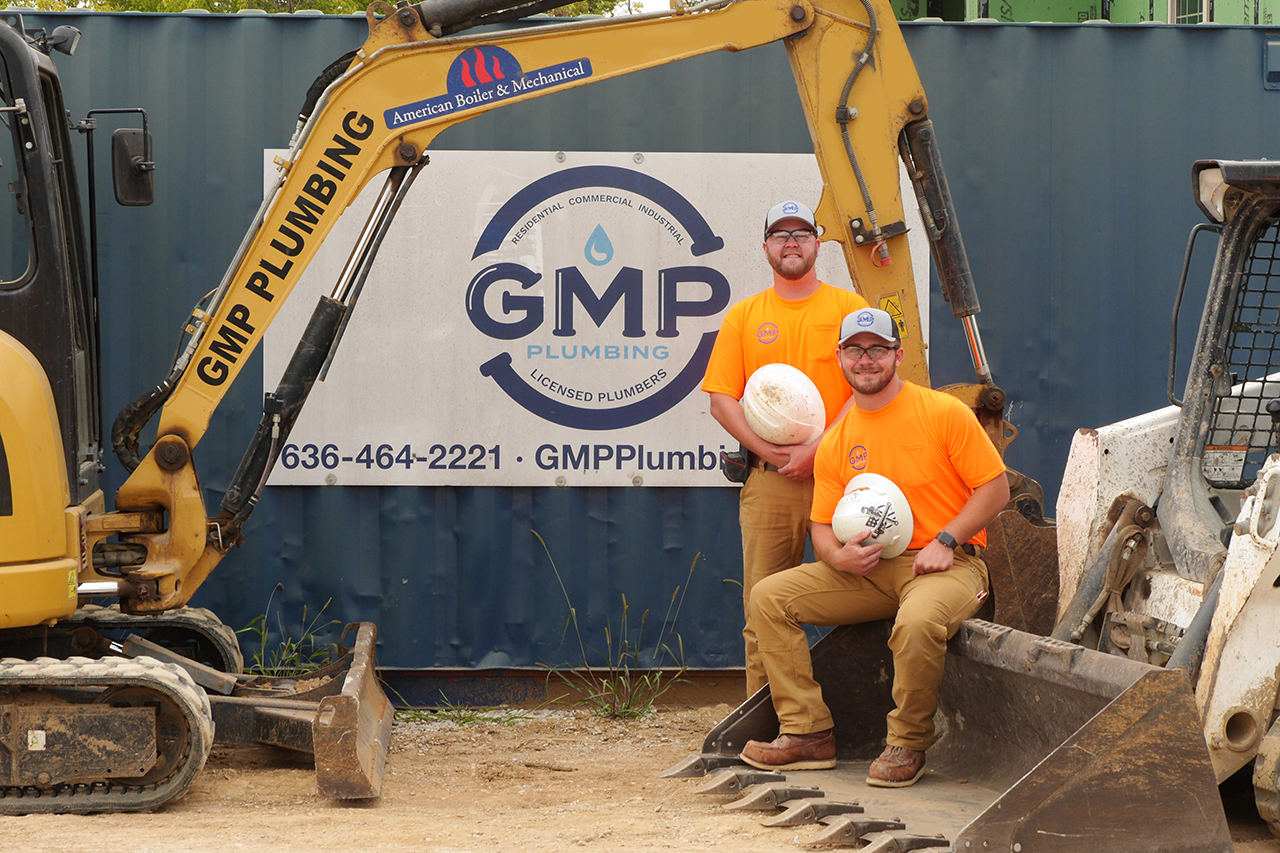 Plumbers taking a break after an industrial plumbing job